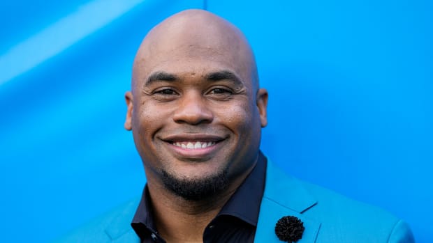 Former Panthers wide receiver and now commentator Steve Smith Sr. smiles before the game between the Panthers and Ravens.