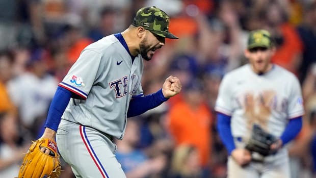 Texas Rangers starting pitcher Martin Perez celebrates after a baseball game against the Houston Astros Friday, May 20, 2022, in Houston. The Rangers won 3-0.