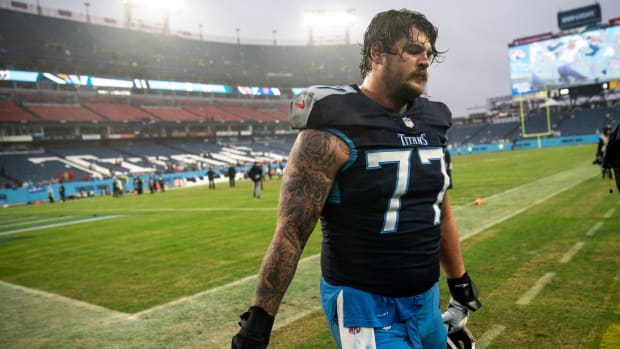 Tennessee Titans offensive tackle Taylor Lewan (77) exits the field after their loss to the Houston Texans at Nissan Stadium in Nashville, Tenn., Sunday, Nov. 21, 2021.