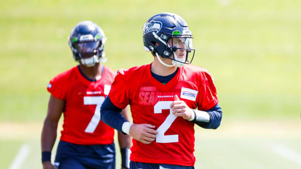 Seattle Seahawks quarterback Drew Lock (2) participates in a drill during an OTA workout at the Virginia Mason Athletic Center.