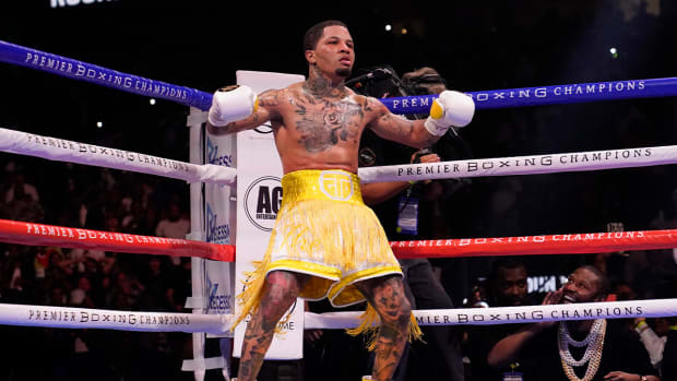 FILE - Gervonta Davis celebrates during a WBA Super Lightweight world championship boxing match against Mario Barrios on Sunday, June 27, 2021, in Atlanta. Gervonta Davis may have met his match when it comes to trading insults. Now it’s about trading punches, and he believes he does that far better than Rolando Romero, his opponent Saturday night when he defends his lightweight title in a matchup of unbeatens in Brooklyn.