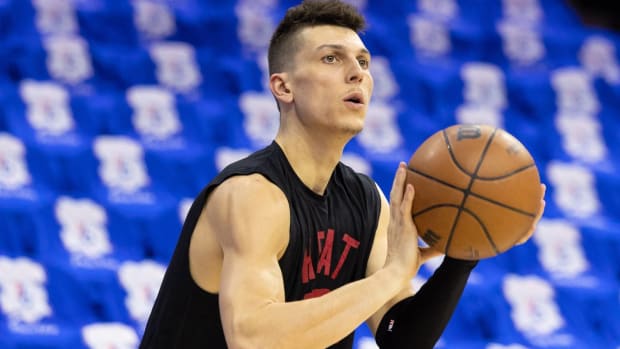 Tyler Herro warms up before a game.