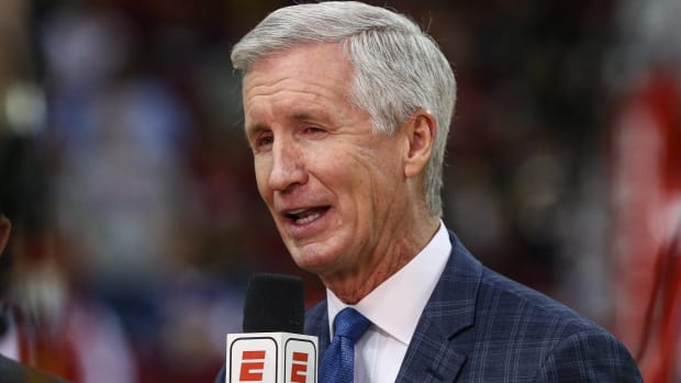 Mike Breen announces a game for ESPN.