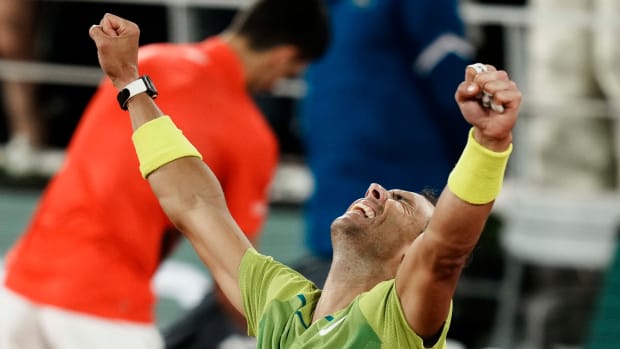 Rafael Nadal celebrates after beating Novak Djokovic at the French Open.