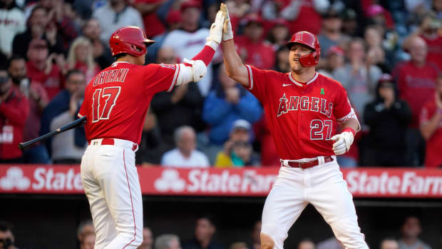 May 10, 2022; Anaheim, California, USA; Los Angeles Angels center fielder Mike Trout (27) celebrates with designated hitter Shohei Ohtani (17) after hitting a home run in the second inning against the Tampa Bay Rays at Angel Stadium.