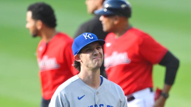 May 31, 2022; Cleveland, Ohio, USA; Kansas City Royals starting pitcher Daniel Lynch (52) walks off the field in the first inning against the Cleveland Guardians at Progressive Field. Mandatory Credit: David Richard-USA TODAY Sports