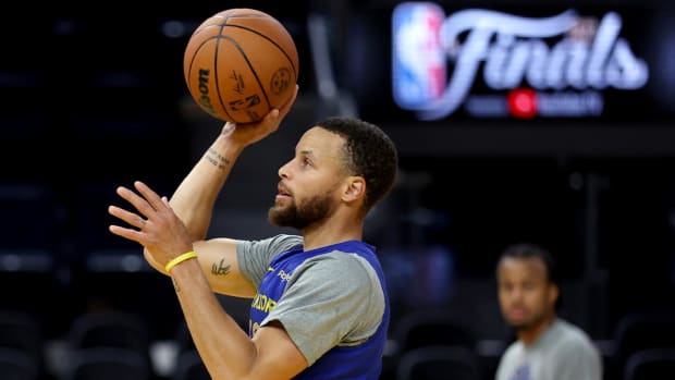 Golden State Warriors guard Stephen Curry shoots during NBA basketball practice in San Francisco, Wednesday, June 1, 2022. The Warriors are scheduled to host the Boston Celtics in Game 1 of the NBA Finals on Thursday.