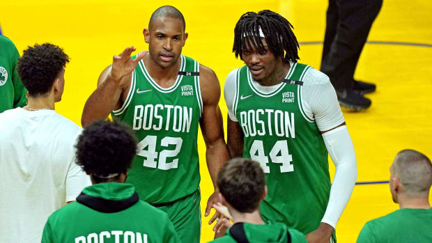 Boston Celtics center Al Horford (42) talks to his team during the second half against the Golden State Warriors.