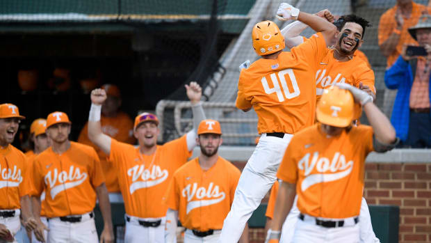 Tennessee first baseman Luc Lipcius (40) celebrates a home run hit with Tennessee infielder Jorel Ortega (2) during a game at Lindsey Nelson Stadium in Knoxville, Tenn. on Friday, May 13, 2022. Kns Tennessee Georgia Baseball