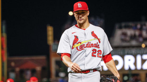 Cardinals starting pitcher Jack Flaherty (22) leaves a game.