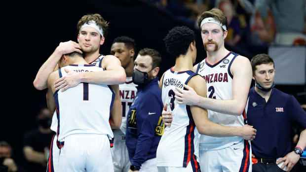 Gonzaga players console each other after the loss to Baylor