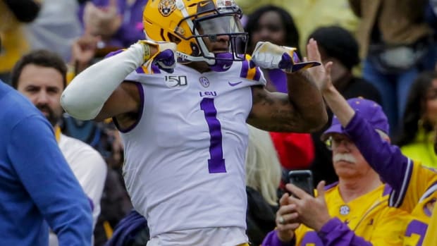 Oct 26, 2019; Baton Rouge, LA, USA; LSU Tigers wide receiver Ja'Marr Chase (1) reacts after a reception against the Auburn Tigers during the first half at Tiger Stadium. Mandatory Credit: Derick E. Hingle-USA TODAY Sports