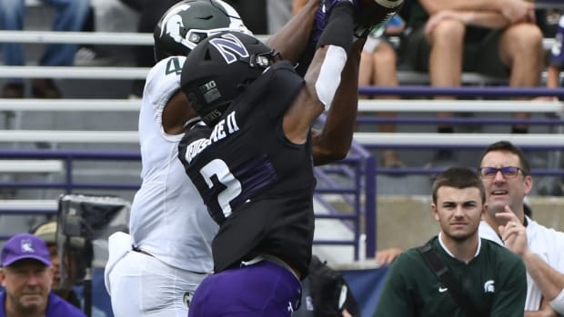 Northwestern Wildcats defensive back Greg Newsome II (2) breaks up a pass meant for Michigan State Spartans wide receiver C.J. Hayes (4) during the first half at Ryan Field.