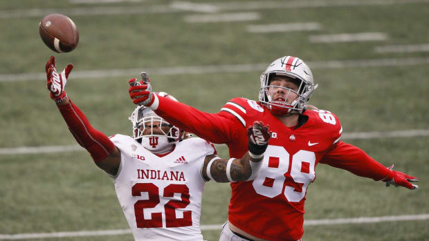 Ohio State Buckeyes tight end Luke Farrell (89) misses a pass under pressure from Indiana Hoosiers defensive back Jamar Johnson (22) during the first quarter of a NCAA Division I football game between the Ohio State Buckeyes and the Indiana Hoosiers on Saturday, Nov. 21, 2020 at Ohio Stadium in Columbus, Ohio. Cfb Indiana Hoosiers At Ohio State Buckeyes