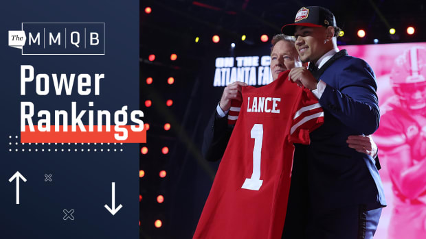 Trey Lance poses with NFL commissioner Roger Goodell after being selected by the 49ers in the 2021 NFL draft