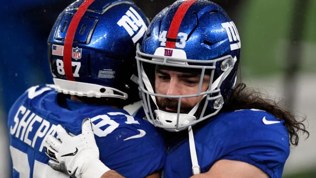 New York Giants wide receiver Sterling Shepard (87) and safety Nate Ebner (43) hug as the Giants defeat the Dallas Cowboys, 23-19, at MetLife Stadium on Sunday, January 3, 2021, in East Rutherford.
