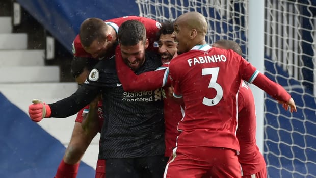 Liverpool goalkeeper Alisson Becker scores a goal