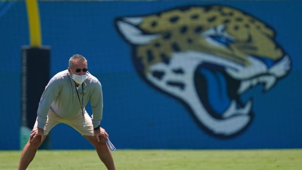 Jacksonville Jaguars head coach Urban Meyer stands mid field during rookie mini camp at TIAA Bank Field.