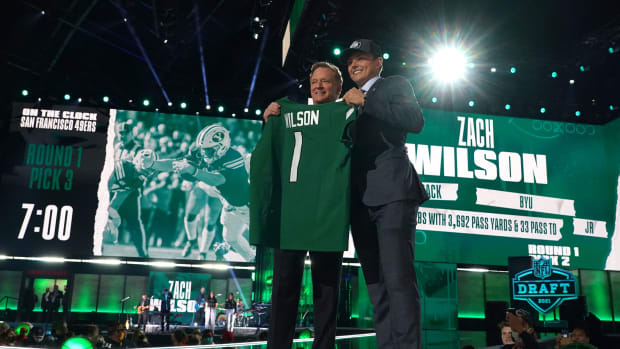 BYU quarterback Zach Wilson poses with NFL commissioner Roger Goodell after being selected as the second pick by the New York Jets during the 2021 NFL Draft at First Energy Stadium.