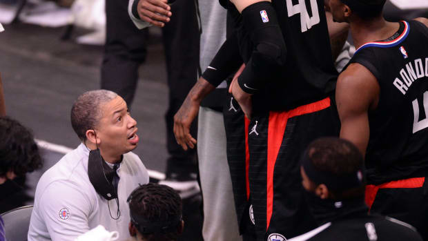 May 13, 2021; Charlotte, North Carolina, USA; Los Angeles Clippers head coach Tyronn Lue (L) talks with his team during the second half against the Charlotte Hornets at the Spectrum Center. Mandatory Credit: Sam Sharpe-USA TODAY Sports