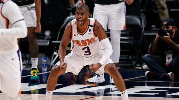 Chris Paul celebrates after a big play with the Suns.