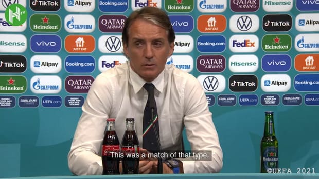Roberto Mancini speaks after a battling victory against Austria