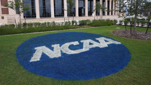 NCAA logo sits on grass