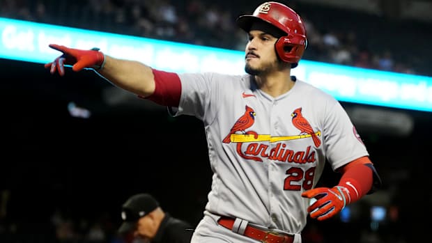 May 28, 2021; Phoenix, Arizona, USA; St. Louis Cardinals third baseman Nolan Arenado (28) points to the fans after hitting a home run against the Arizona Diamondbacks in the third inning at Chase Field.