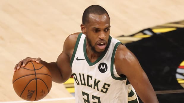 Milwaukee Bucks forward Khris Middleton (22) dribbles the ball