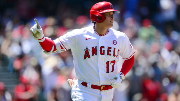 Los Angeles Angels designated hitter Shohei Ohtani (17) reacts after hitting a solo home run against the Baltimore Orioles during the third inning at Angel Stadium.
