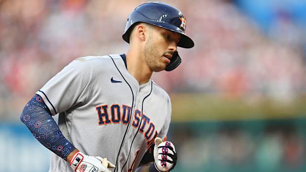 Jul 3, 2021; Cleveland, Ohio, USA; Houston Astros shortstop Carlos Correa (1) rounds the bases after hitting a home run against the Cleveland Indians during the fourth inning at Progressive Field.
