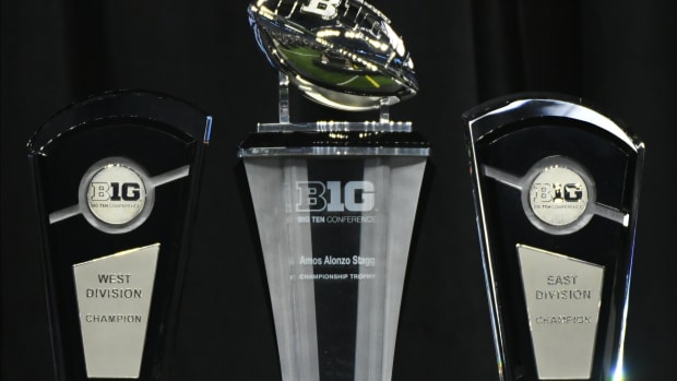 The Big 10 division and conference championship trophies are displayed during Big 10 media days at Lucas Oil Stadium. Robert Goddin-USA TODAY Sports