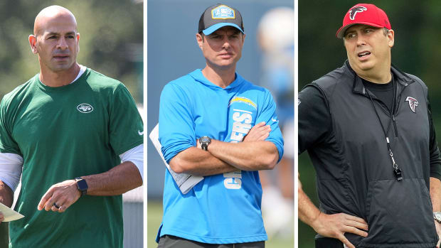 Separate photos of Jets coach Robert Saleh, Chargers coach Brandon Staley and Falcons coach Arthur Smith at training camp practices
