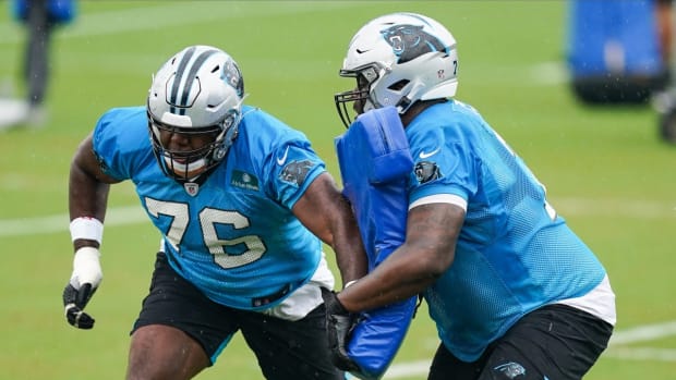 Aug 21, 2020; Charlotte, North Carolina, USA; Carolina Panthers offensive tackle Russell Okung (76) participates in drills during training camp held at the Panthers training facility. Mandatory Credit: