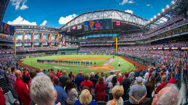 Apr 5, 2021; Arlington, Texas, USA; A view of the field and the fans and the ballpark and the players during the playing of US and Canadian national anthems before the game between the Texas Rangers and the Toronto Blue Jays at Globe Life Field.