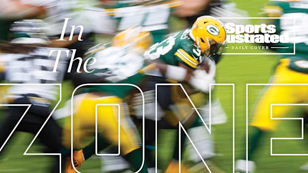 Packers run play on SI Daily Cover about the wide-zone offensive trend
