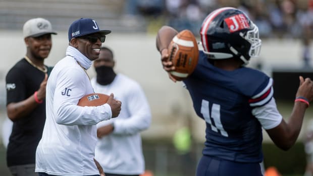 Jackson State University head football coach Deion Sanders and his team get ready for their game against Mississippi Valley State at Veterans Memorial Stadium in Jackson, Miss., Sunday, March 14, 2021. Sdw 2972