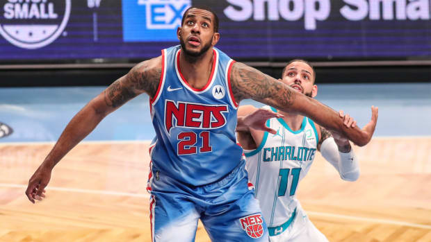 Apr 1, 2021; Brooklyn, New York, USA; Brooklyn Nets center LaMarcus Aldridge (21) Charlotte Hornets forward Cody Martin (11) at Barclays Center.
