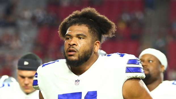 Aug 13, 2021; Glendale, Arizona, USA; Dallas Cowboys tackle La'El Collins (71) prior to the game against the Arizona Cardinals at State Farm Stadium.
