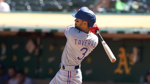 Sep 12, 2021; Oakland, California, USA; Texas Rangers center fielder Leody Taveras (3) hits an RBI triple during the fourth inning against the Oakland Athletics at RingCentral Coliseum.