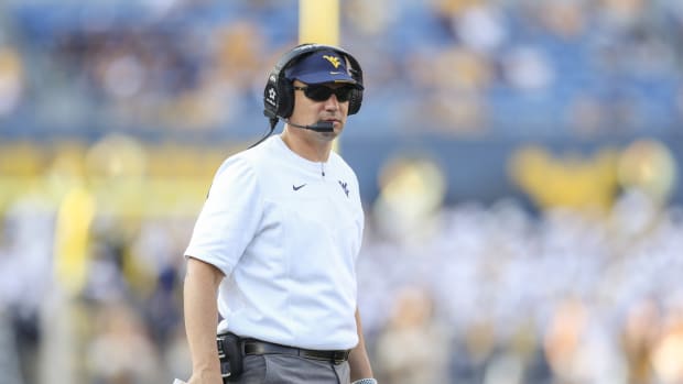 Sep 11, 2021; Morgantown, West Virginia, USA; West Virginia Mountaineers head coach Neal Brown looks on from the sideline during the second quarter against the Long Island Sharks at Mountaineer Field at Milan Puskar Stadium.