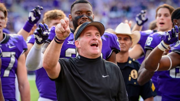 Sep 11, 2021; Fort Worth, Texas, USA; TCU Horned Frogs head coach Gary Patterson sings the school alma mater after the win over the California Golden Bears at Amon G. Carter Stadium.