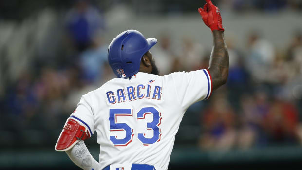 Sep 14, 2021; Arlington, Texas, USA; Texas Rangers right fielder Adolis Garcia (53) rounds the bases after hitting a home run in the third inning against the Houston Astros at Globe Life Field.