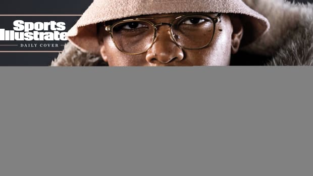 Portrait of Orlando Brown Jr. in mink coat for SI Daily Cover