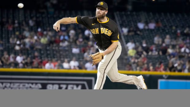 Aug 15, 2021; Phoenix, Arizona, USA; San Diego Padres relief pitcher Austin Adams (54) throws against the Arizona Diamondbacks in the ninth inning at Chase Field.
