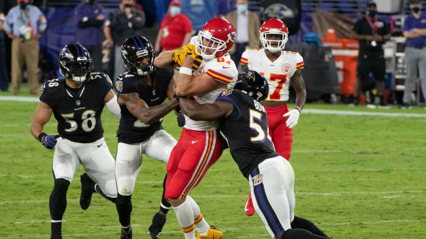 Sep 28, 2020; Baltimore, Maryland, USA; Kansas City Chiefs tight end Travis Kelce (87) runs for more yards as Baltimore Ravens linebacker Tyus Bowser (54) tackle during the first quarter at M&T Bank Stadium. Mandatory Credit: Tommy Gilligan-USA TODAY Sports