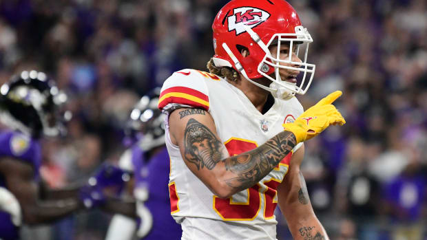 Sep 19, 2021; Baltimore, Maryland, USA; Kansas City Chiefs safety Tyrann Mathieu (32) signals to the stands during the fourth quarter against the Baltimore Ravens at M&T Bank Stadium. Mandatory Credit: Tommy Gilligan-USA TODAY Sports