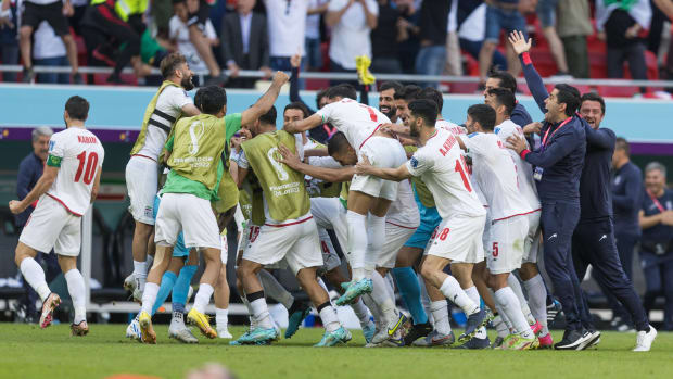 Iran's players pictured celebrating after beating Wales 2-0 in their second group game at the 2022 FIFA World Cup in Qatar