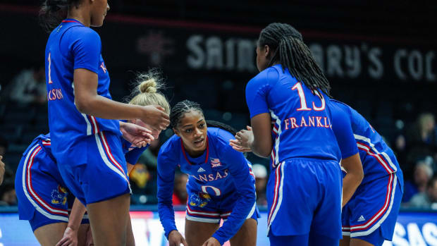 Kansas Jayhawks players huddle during a break in the action against the Maine Black Bears on Friday November 26 2022. Moraga, CA