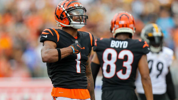 Sep 11, 2022; Cincinnati, Ohio, USA; Cincinnati Bengals wide receiver Ja'Marr Chase (1) reacts after moving the ball forward against the Pittsburgh Steelers in the first half at Paycor Stadium. Mandatory Credit: Katie Stratman-USA TODAY Sports